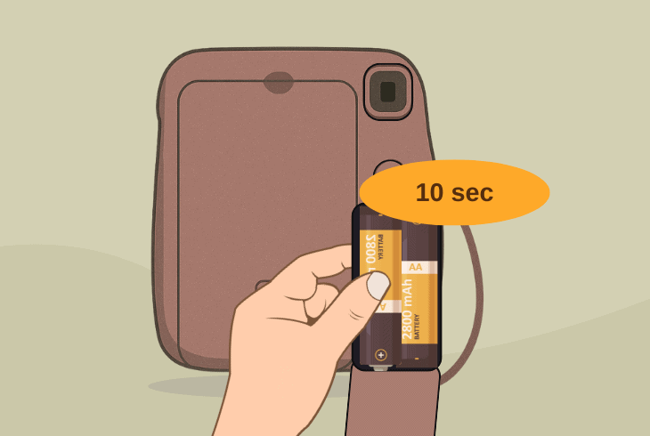 reset the instax mini 12 lens mechanism
